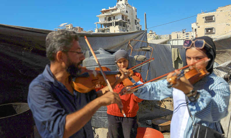 Gaza's young musicians sing and play in the ruins of war